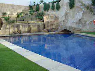 Exe Cunit Suites & Spa فندق